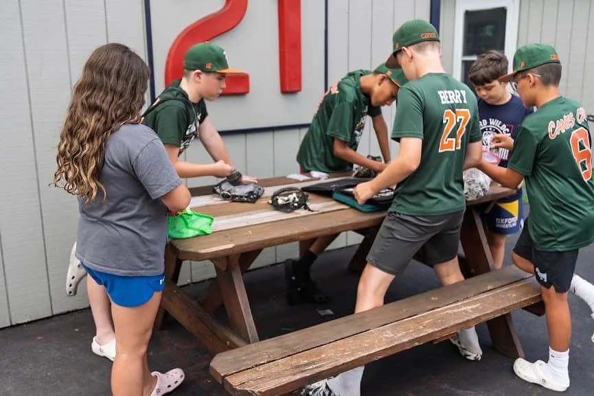 Players trading pins with other teams in the village