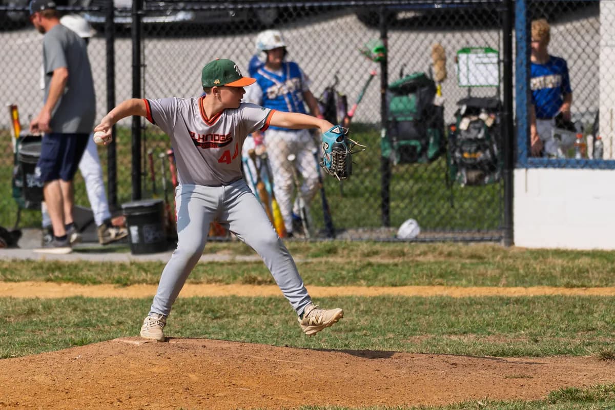 A Hurricanes pitcher driving toward the plate